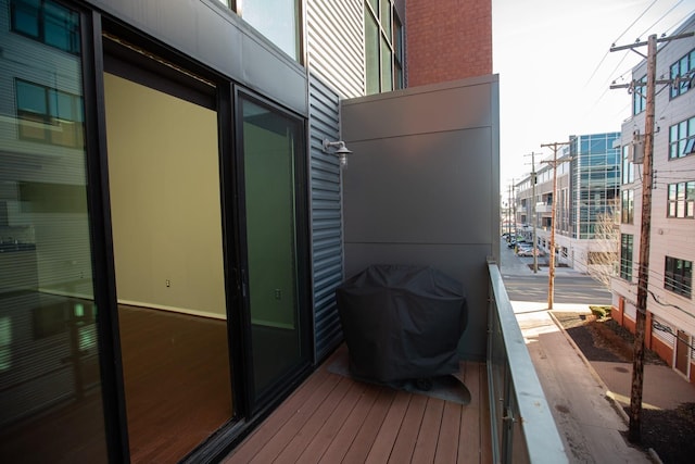 balcony featuring area for grilling