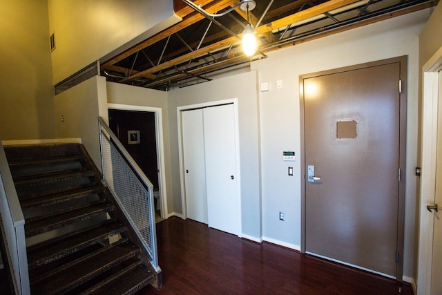 entryway featuring dark wood-type flooring