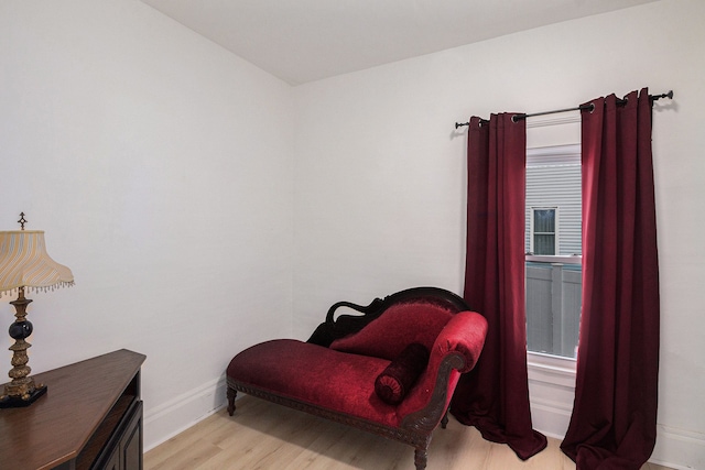 sitting room with light hardwood / wood-style floors