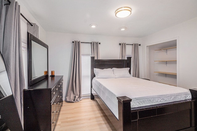 bedroom featuring light hardwood / wood-style floors