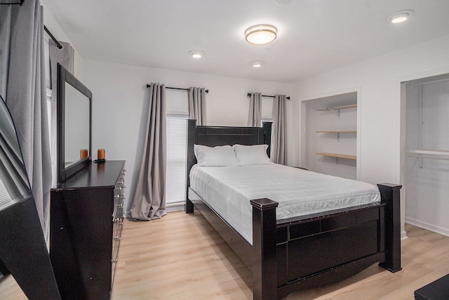 bedroom featuring light wood-type flooring