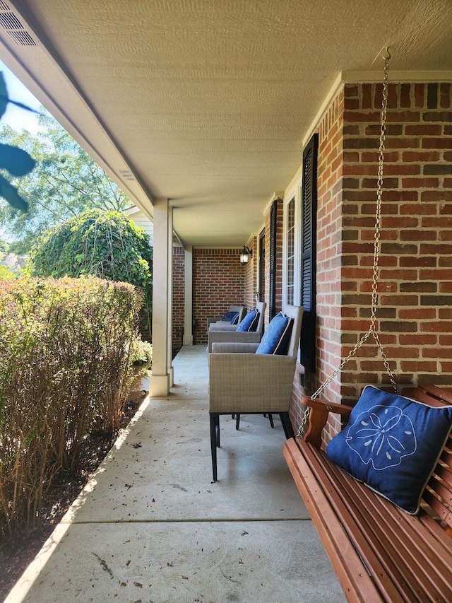 view of patio featuring covered porch