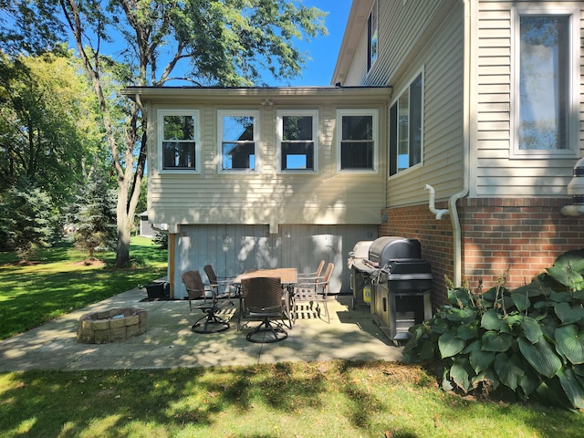 rear view of property with a patio area