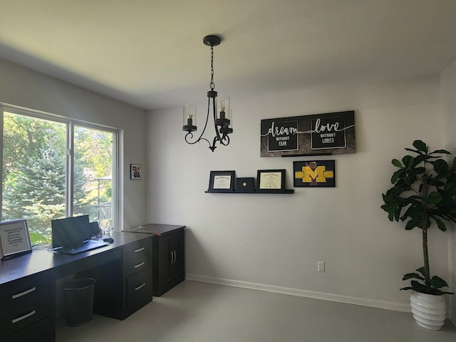 home office featuring a notable chandelier