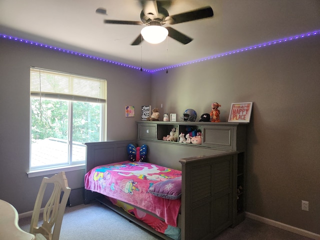 carpeted bedroom with ceiling fan