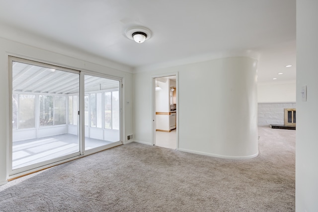 unfurnished room featuring carpet floors