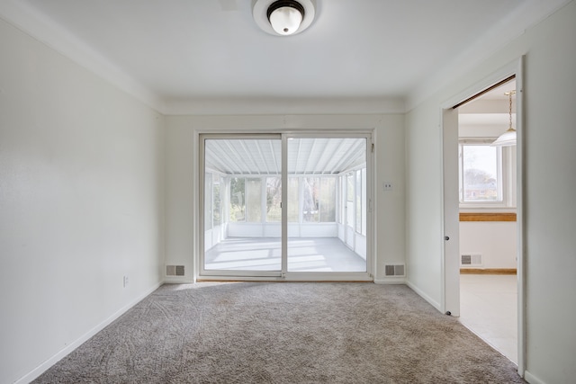 view of carpeted spare room