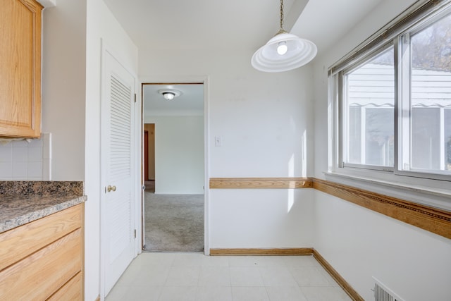 view of unfurnished dining area