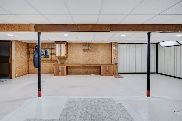 basement with a drop ceiling