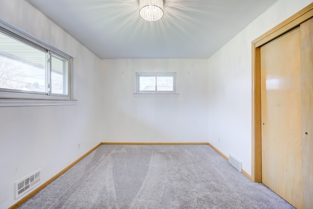 spare room with carpet flooring