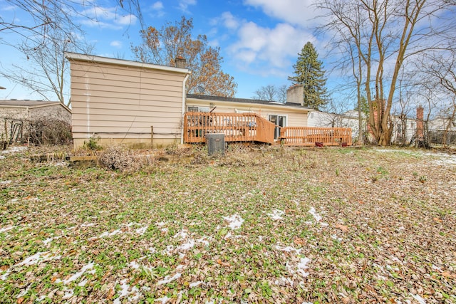 view of yard featuring a wooden deck