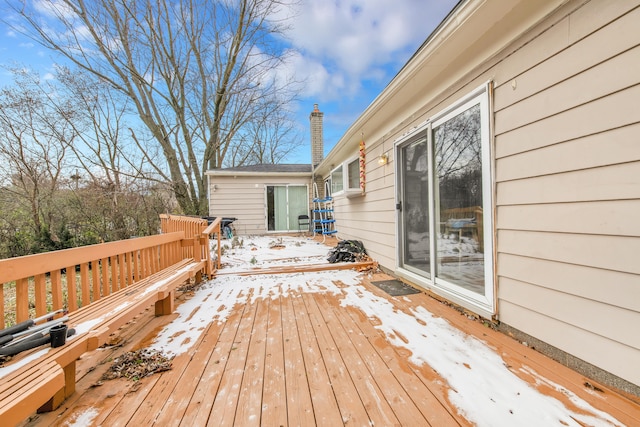 view of snow covered deck