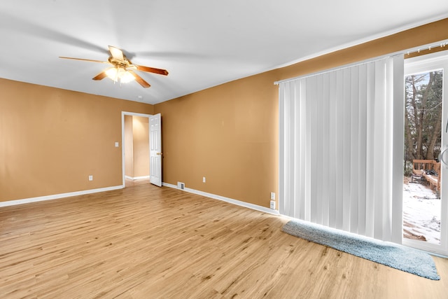 unfurnished room featuring light hardwood / wood-style floors and ceiling fan