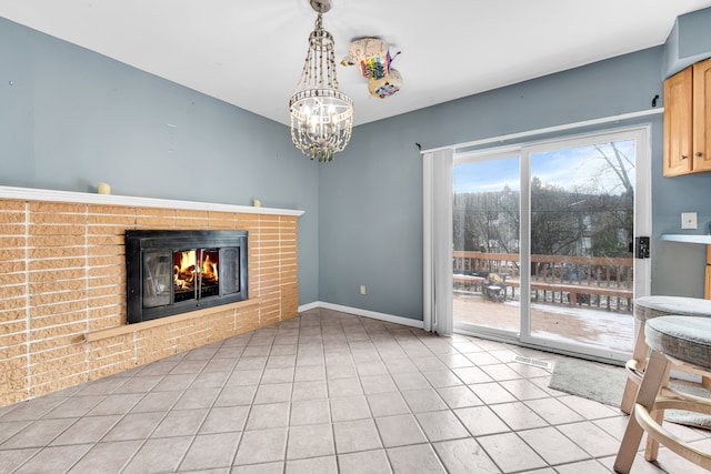 unfurnished living room featuring light tile patterned floors and an inviting chandelier