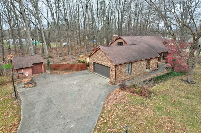 view of home's exterior featuring an outbuilding