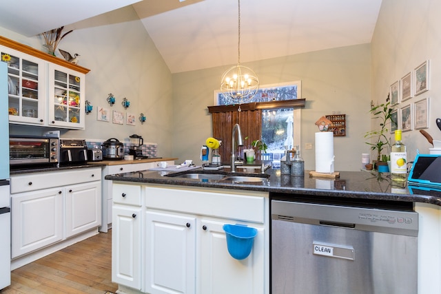 kitchen with stainless steel dishwasher, sink, an inviting chandelier, light hardwood / wood-style flooring, and white cabinets