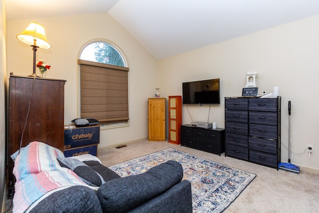 living room featuring light carpet and lofted ceiling