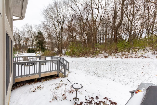 view of snow covered deck