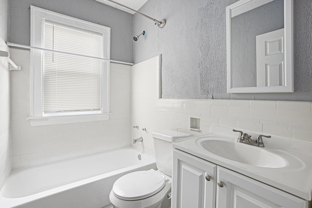 full bathroom featuring vanity, toilet, and bathtub / shower combination