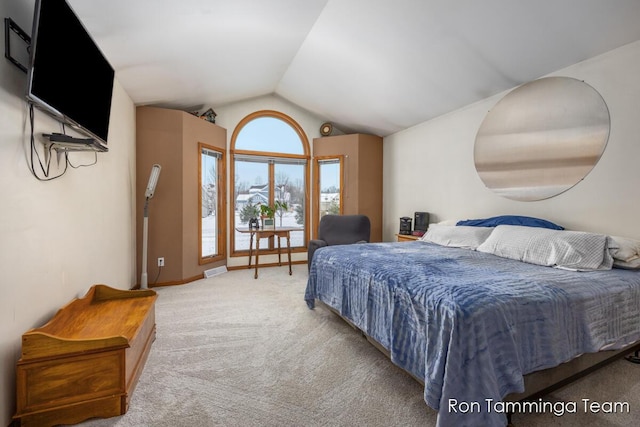 2187 Riley St, Hudsonville, MI 49426 - bedroom with lofted ceiling, carpet flooring, and baseboards