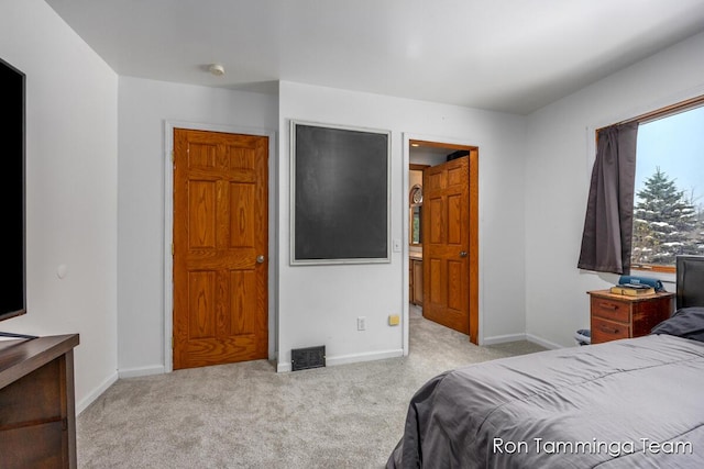 2187 Riley St, Hudsonville, MI 49426 - bedroom with carpet and baseboards