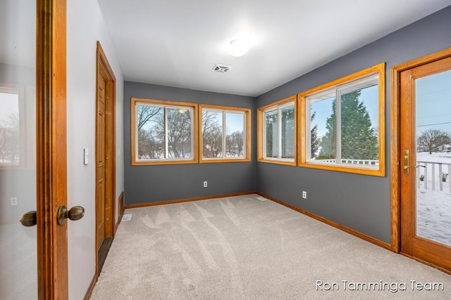 2187 Riley St, Hudsonville, MI 49426 - spare room with light colored carpet and baseboards