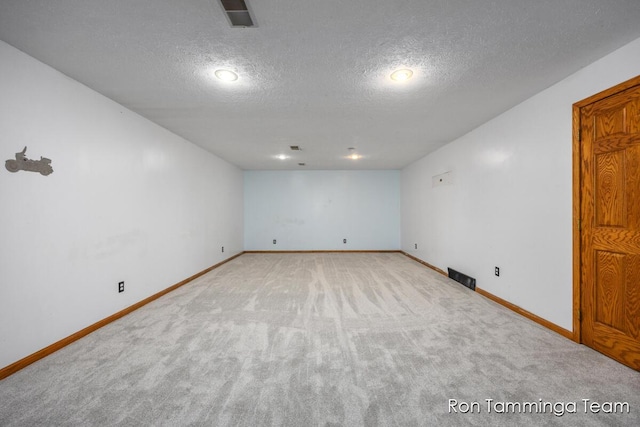 2187 Riley St, Hudsonville, MI 49426 - finished below grade area with carpet floors, a textured ceiling, baseboards, and recessed lighting