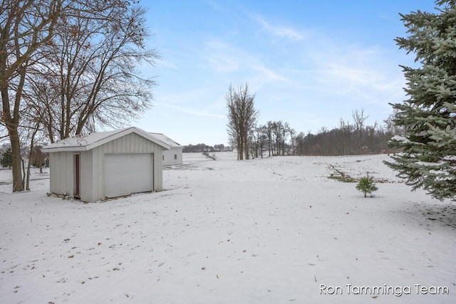 2187 Riley St, Hudsonville, MI 49426 - yard layered in snow featuring an outdoor structure