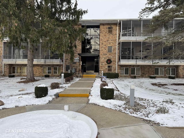 view of snow covered building