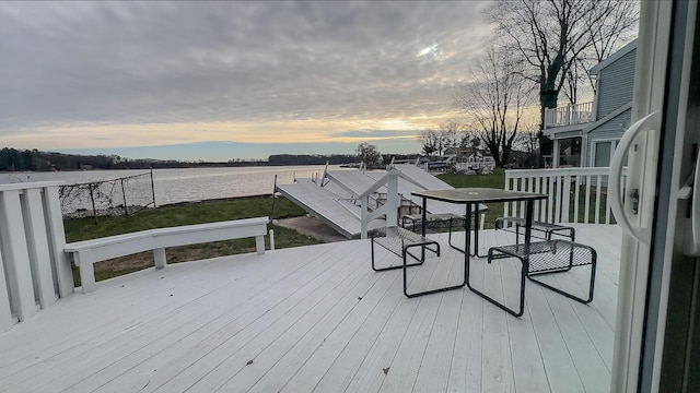 deck at dusk with a water view