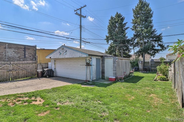 garage with a yard