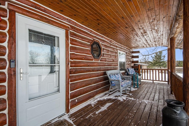 wooden deck featuring a porch