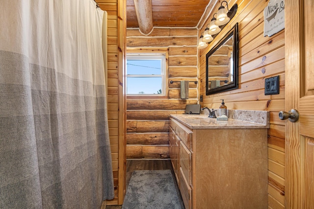 bathroom featuring rustic walls, hardwood / wood-style floors, beamed ceiling, and wood ceiling