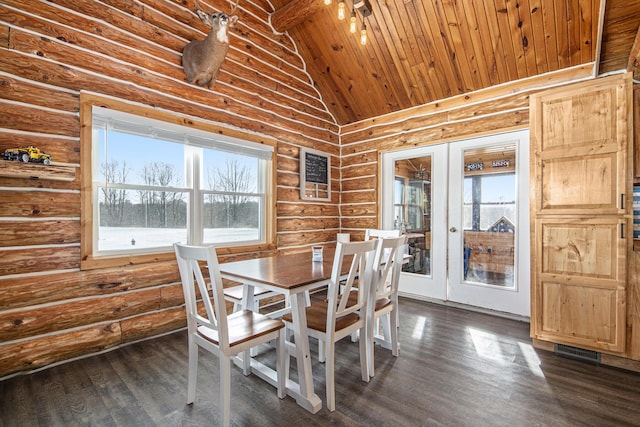 dining room with wood ceiling, rustic walls, french doors, and dark wood-type flooring