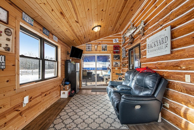 unfurnished room featuring wooden ceiling, wood walls, dark hardwood / wood-style floors, and lofted ceiling