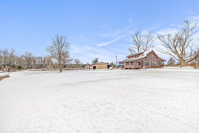 view of yard covered in snow