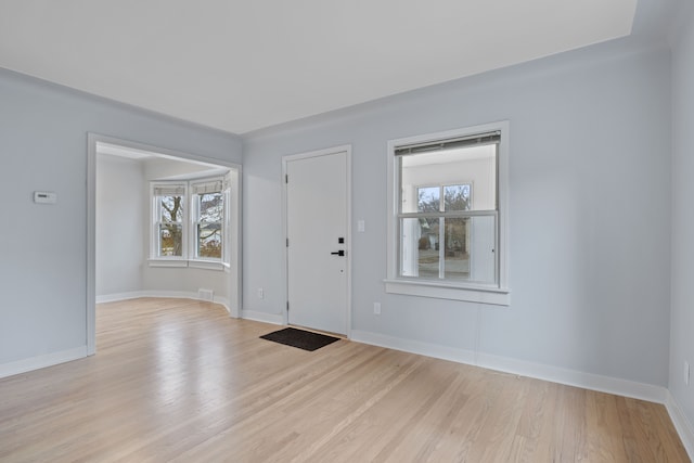 foyer entrance featuring light hardwood / wood-style floors