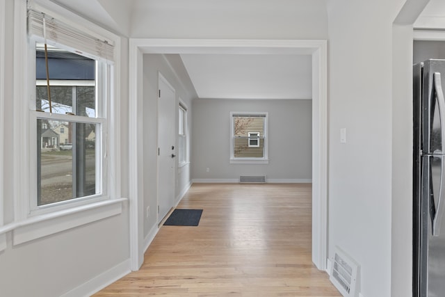 hall featuring light wood-type flooring