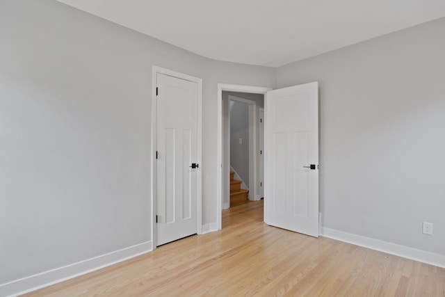 spare room with light wood-type flooring