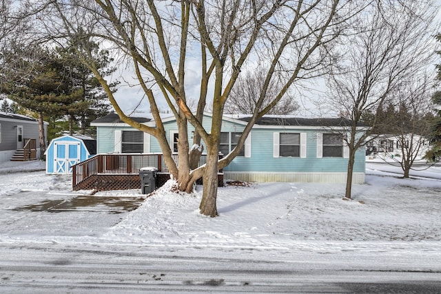 view of front of house with a storage unit