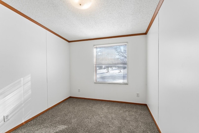 empty room with carpet floors, a textured ceiling, and ornamental molding