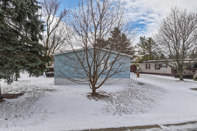 view of snow covered property