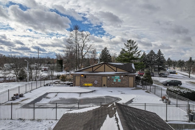 view of snow covered deck