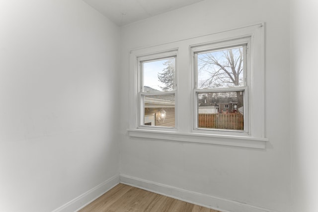 spare room with light wood-type flooring