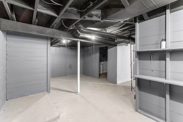 basement featuring separate washer and dryer