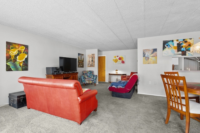 living room with carpet floors and a textured ceiling