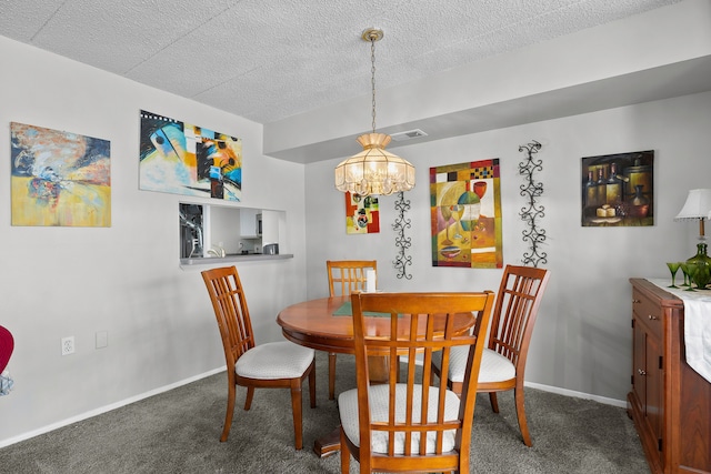 dining space featuring carpet floors, a textured ceiling, and an inviting chandelier