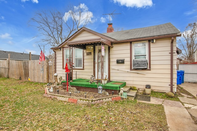 bungalow with a front yard