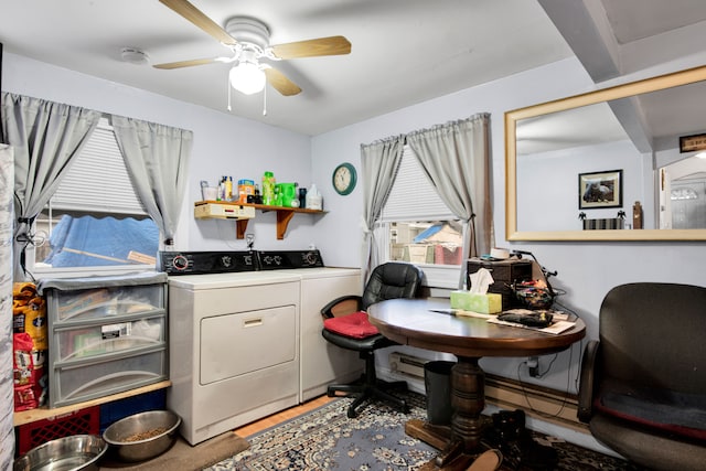 laundry room with ceiling fan and separate washer and dryer