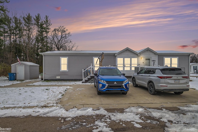 manufactured / mobile home with a shed